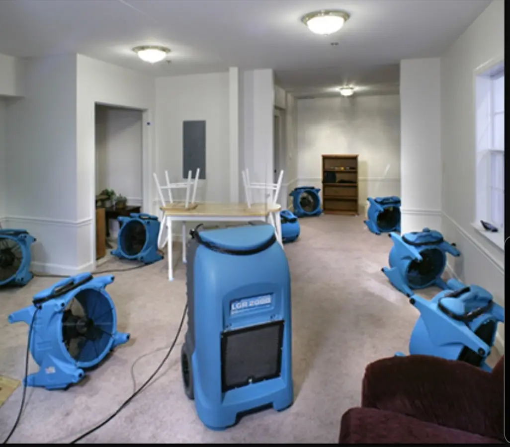 Air movers and dehumidifier setup for Water Damage Restoration in Sudbury